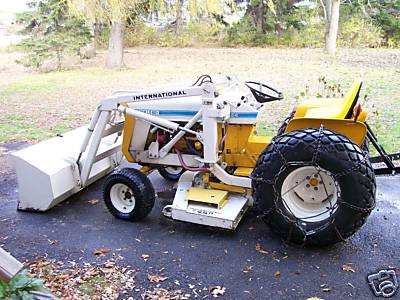 1050A Loader with 3260 Mower and 3 Point Hitch on 154 1.JPG