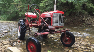 Tractor in Creek.PNG